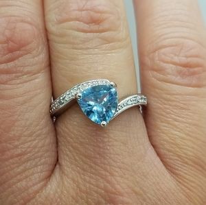 Blue Topaz and Diamond act. Ring